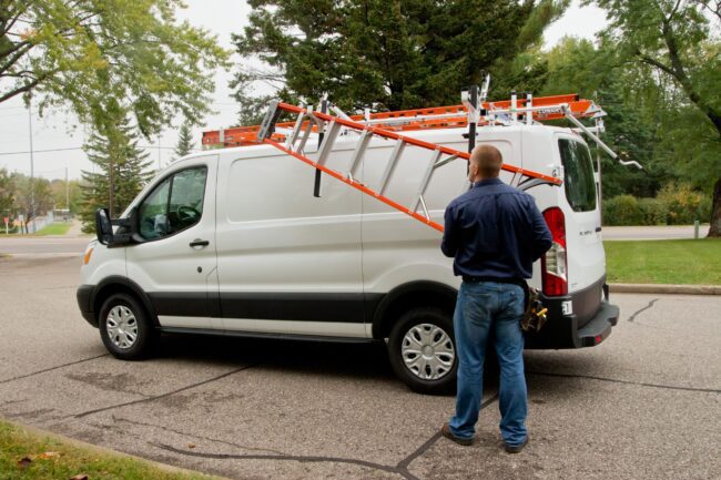 Outside view pf Prime Design ladder rack installed on a Ford Transit.