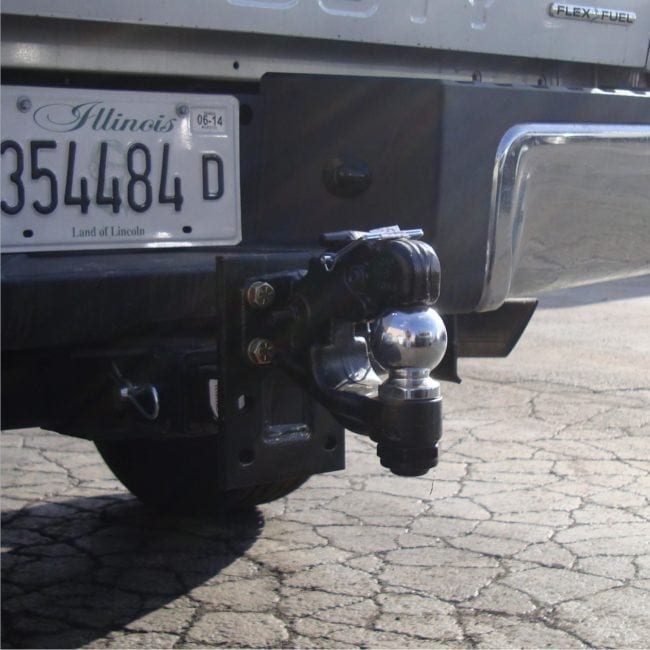 Curt Manufacturing 2 5/16 Inch Ball and Pintle Combo Model 48324 installed on a heavy duty truck or SUV.