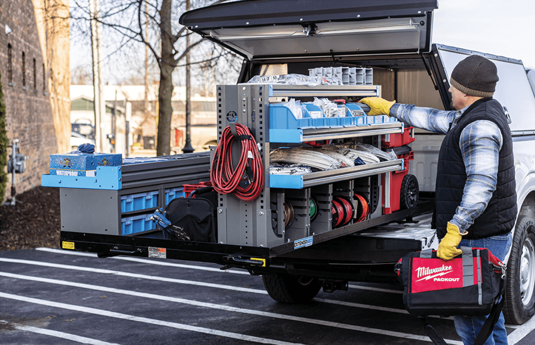 Commercial Truck Bed Sliding Platform extended to show access to tools and supplies.