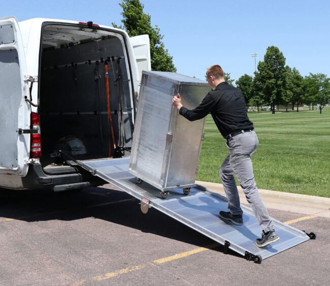 View of bi-fold Link ramp installed in the rear of a van.